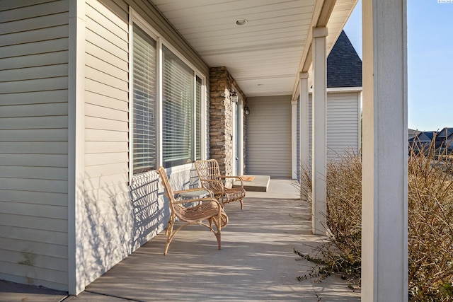 wooden deck featuring a porch