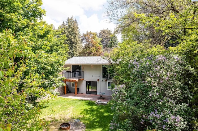 1315 NW Haven Cir, Pullman, WA 99163 - back of property with a patio and a yard