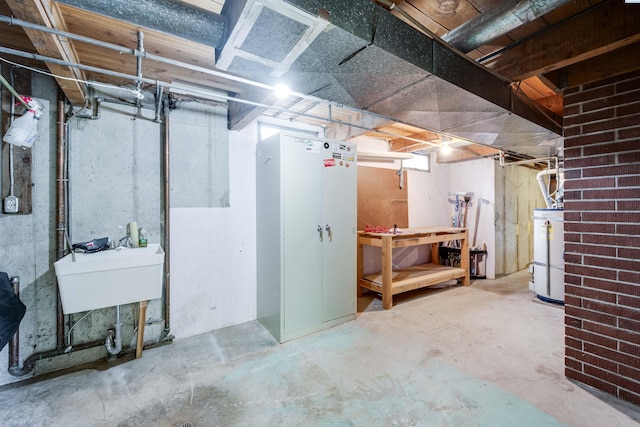 1315 NW Haven Cir, Pullman, WA 99163 - unfinished below grade area with secured water heater and a sink