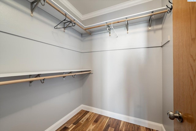 521 Eastgate Dr, Prosser, WA 99350 - walk in closet featuring dark wood-style flooring