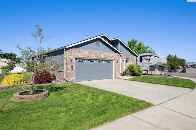 521 Eastgate Dr, Prosser, WA 99350 - ranch-style home featuring brick siding, an attached garage, driveway, and a front lawn