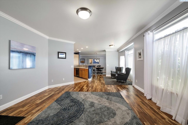 521 Eastgate Dr, Prosser, WA 99350 - living room with ornamental molding, dark wood-style flooring, and baseboards