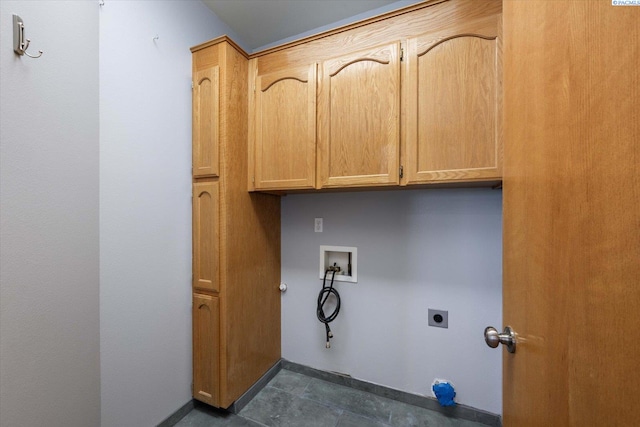 521 Eastgate Dr, Prosser, WA 99350 - clothes washing area featuring washer hookup, electric dryer hookup, cabinet space, and baseboards