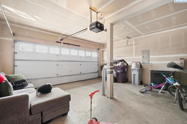 573-575 SE Shoemaker Pl, Pullman, WA 99163 - garage featuring a garage door opener and electric panel