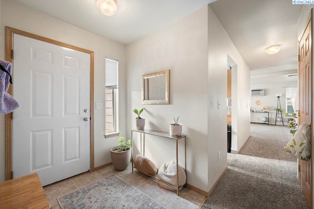 573-575 SE Shoemaker Pl, Pullman, WA 99163 - foyer with a wall unit AC and light tile patterned floors