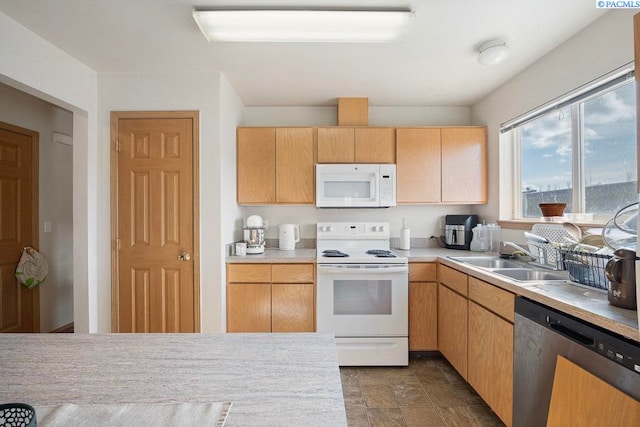 573-575 SE Shoemaker Pl, Pullman, WA 99163 - kitchen featuring white appliances, light countertops, and stone finish flooring