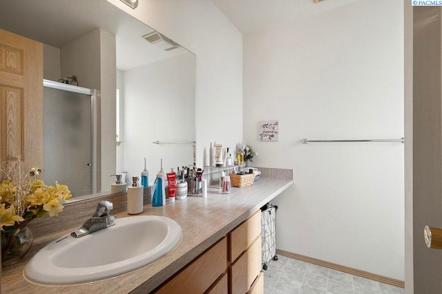 573-575 SE Shoemaker Pl, Pullman, WA 99163 - bathroom with vanity and a shower stall