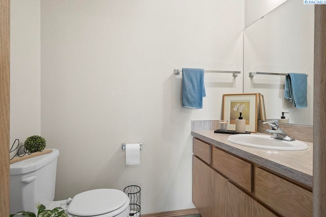 573-575 SE Shoemaker Pl, Pullman, WA 99163 - half bathroom featuring toilet and vanity
