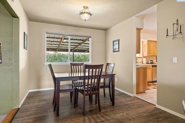 4016 W Ruby, Pasco, WA 99301 - dining area featuring wood finished floors and a textured wall