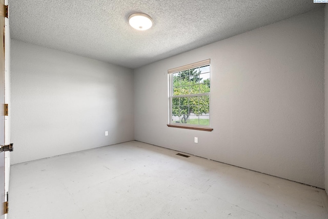 4016 W Ruby, Pasco, WA 99301 - empty room with a textured ceiling