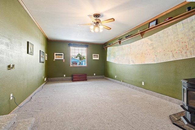4016 W Ruby, Pasco, WA 99301 - unfurnished room featuring a wood stove, crown molding, ceiling fan, carpet, and a textured wall