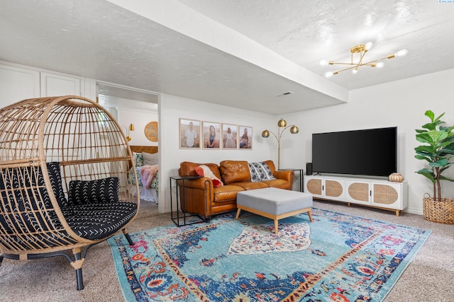 carpeted living room with a chandelier and a textured ceiling