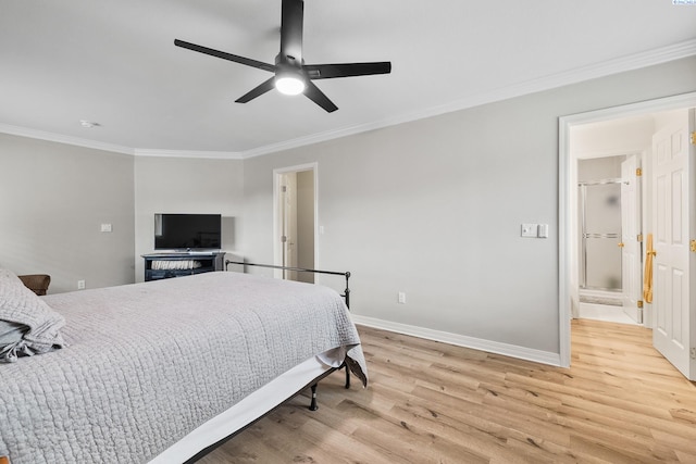 bedroom featuring crown molding, light hardwood / wood-style floors, ceiling fan, and ensuite bathroom