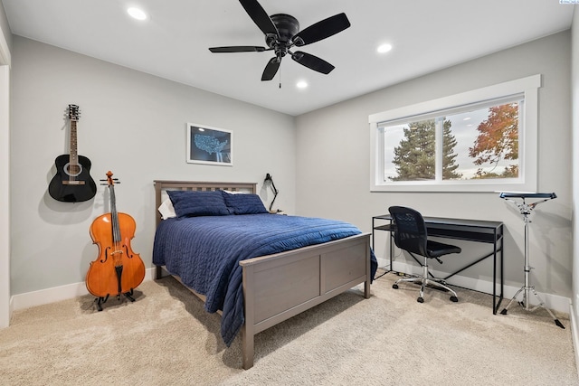 bedroom with light colored carpet and ceiling fan