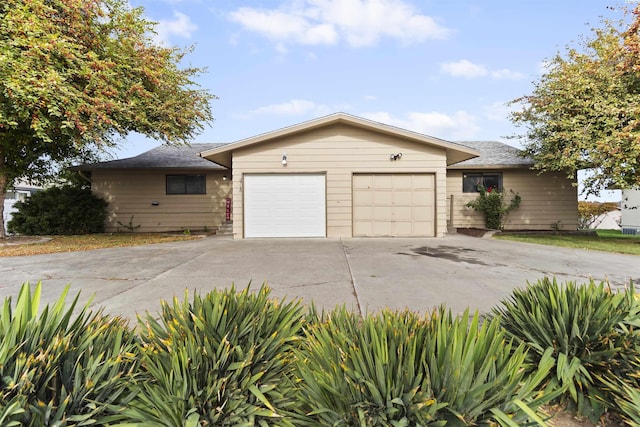 single story home with a garage