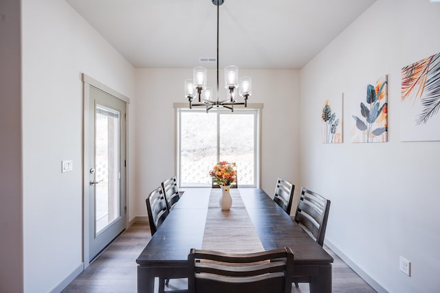 630 SW Cayuse St, Pullman, WA 99163 - dining space featuring a chandelier and wood finished floors