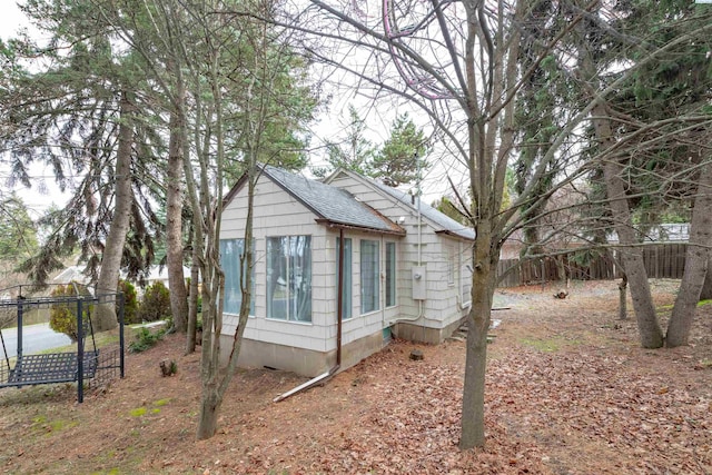 615 SW Winter Cir, Pullman, WA 99163 - view of home's exterior featuring a shingled roof