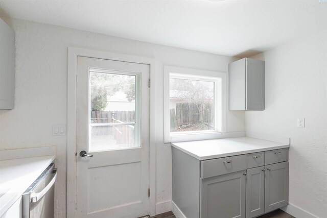 615 SW Winter Cir, Pullman, WA 99163 - doorway to outside featuring baseboards
