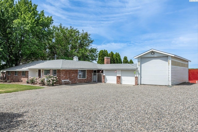 single story home with a garage