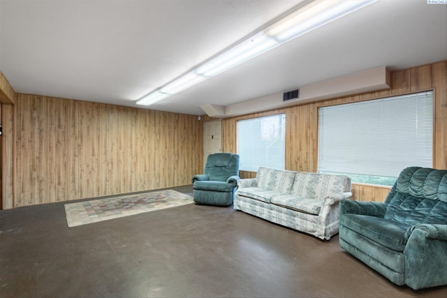 interior space featuring wood walls