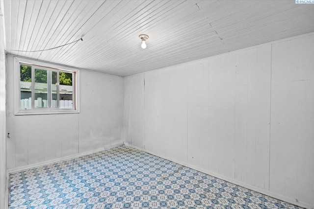 836 Main St, Prosser, WA 99350 - unfurnished room with wood ceiling and tile patterned floors