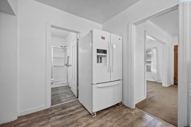 836 Main St, Prosser, WA 99350 - kitchen featuring white fridge with ice dispenser and wood finished floors
