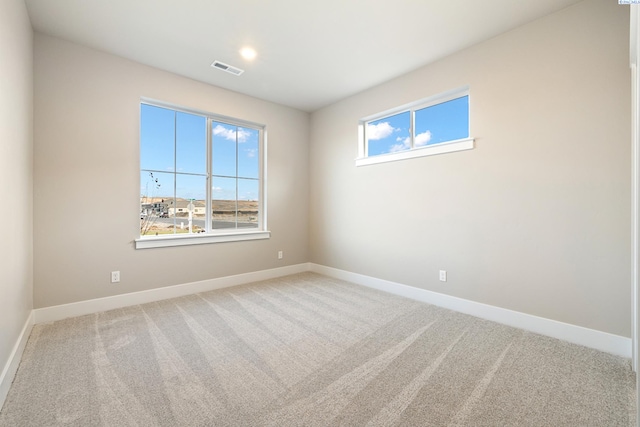 view of carpeted spare room