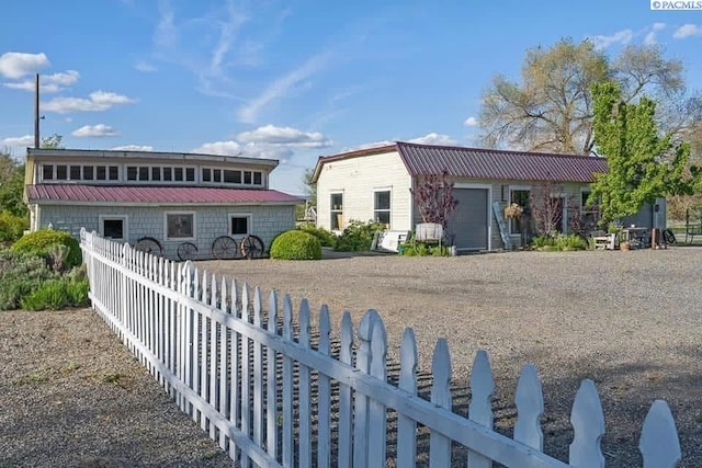 257 N Wamba Rd, Prosser, WA 99350 - view of front of home featuring metal roof and an attached garage