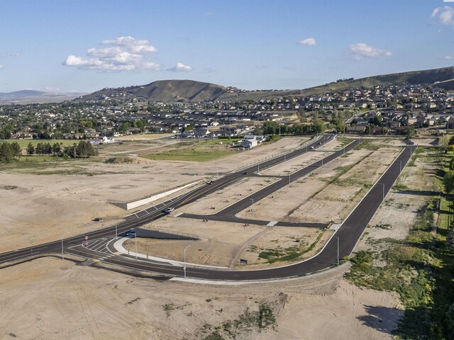 1176 Lapins Ct, Richland, WA 99352 - aerial overview of property's location with mountains and nearby suburban area