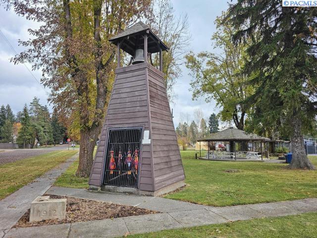 view of home's community with a gazebo and a lawn