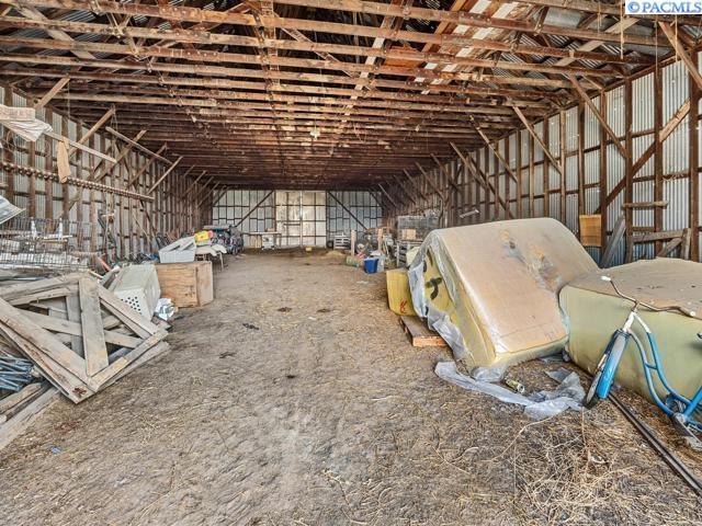 misc room with vaulted ceiling