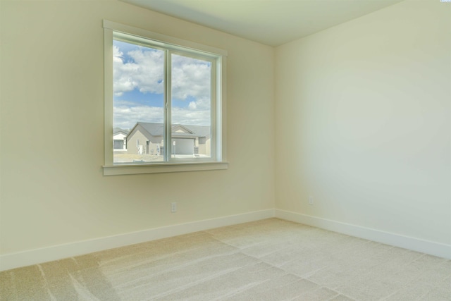 9418 Balflour Ct, Pasco, WA 99301 - carpeted spare room featuring baseboards