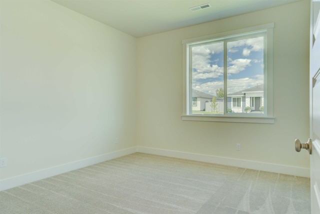 9418 Balflour Ct, Pasco, WA 99301 - carpeted empty room featuring baseboards and healthy amount of natural light