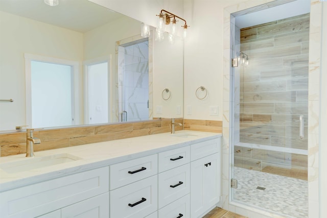 9418 Balflour Ct, Pasco, WA 99301 - bathroom featuring a shower stall and double vanity