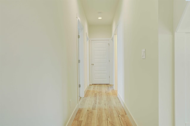 9418 Balflour Ct, Pasco, WA 99301 - corridor featuring light wood-type flooring and baseboards