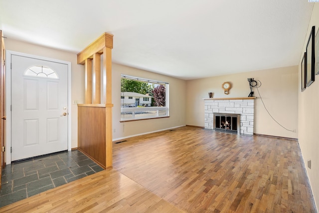 2120 Austin St, Richland, WA 99354 - foyer entrance featuring wood finished floors, baseboards, and a fireplace