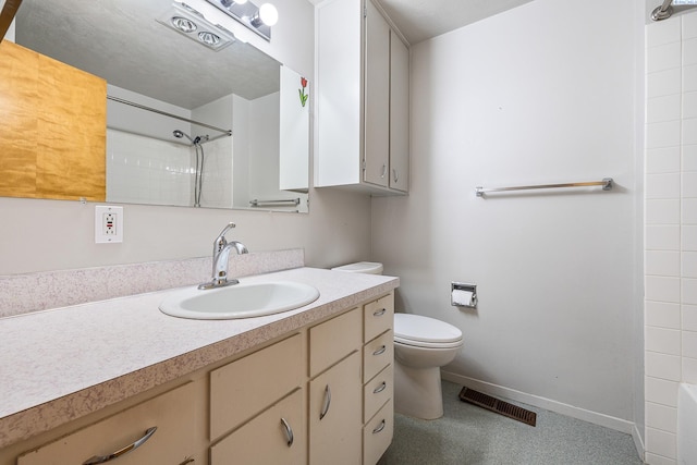 2120 Austin St, Richland, WA 99354 - bathroom with vanity, toilet, baseboards, and tub / shower combination