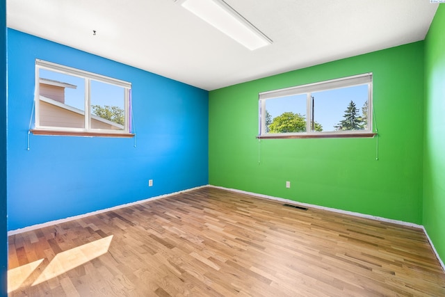 2120 Austin St, Richland, WA 99354 - unfurnished room with wood finished floors and baseboards