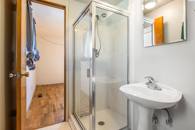 2120 Austin St, Richland, WA 99354 - full bath featuring a shower stall and wood finished floors