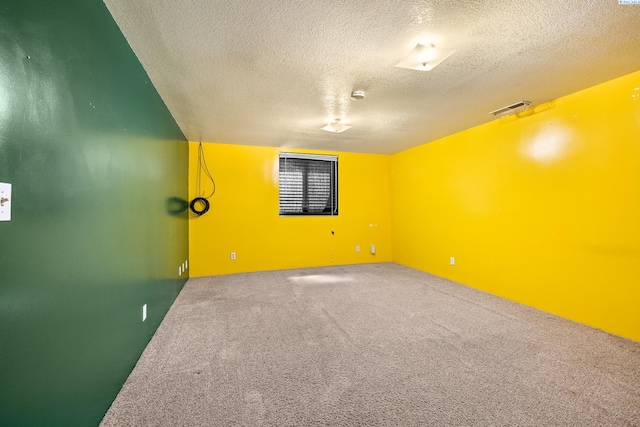 2120 Austin St, Richland, WA 99354 - empty room featuring a textured ceiling and carpet floors