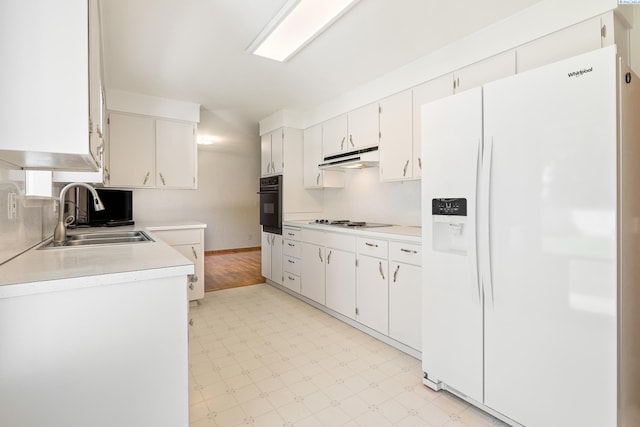 2120 Austin St, Richland, WA 99354 - kitchen featuring white fridge with ice dispenser, a sink, light flooring, light countertops, and cooktop