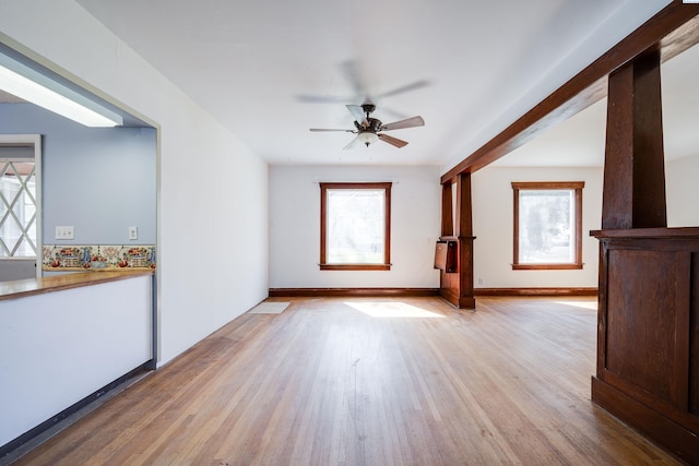212 C St, Endicott, WA 99125 - unfurnished living room featuring healthy amount of natural light, light wood finished floors, and a ceiling fan