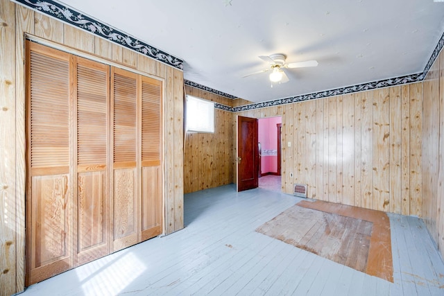 212 C St, Endicott, WA 99125 - unfurnished bedroom with wood-type flooring, a closet, and a ceiling fan