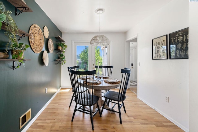 3011 W Hood Ave, Kennewick, WA 99336 - dining space featuring light wood finished floors, baseboards, and french doors