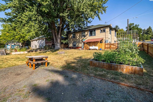 view of yard with an outdoor fire pit