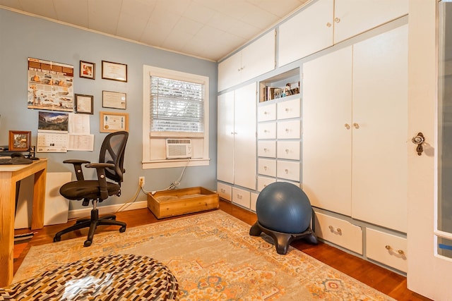 office area featuring crown molding, wood-type flooring, and cooling unit