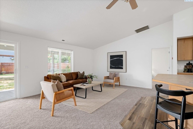 1713 W 39th Ave, Kennewick, WA 99337 - carpeted living area featuring a ceiling fan and lofted ceiling