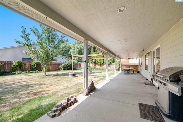 1713 W 39th Ave, Kennewick, WA 99337 - fenced backyard featuring a grill, a patio area, and outdoor dining space