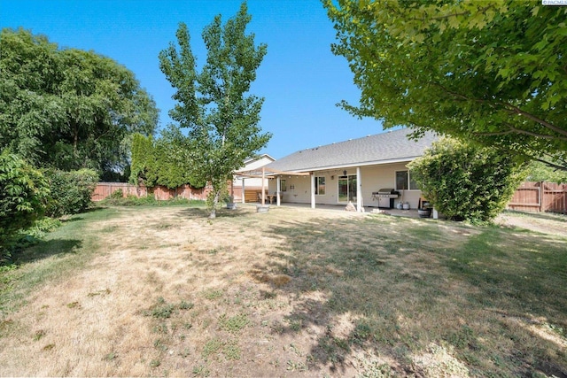 1713 W 39th Ave, Kennewick, WA 99337 - fenced backyard with a patio