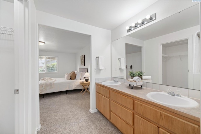 1713 W 39th Ave, Kennewick, WA 99337 - ensuite bathroom with double vanity and a walk in closet